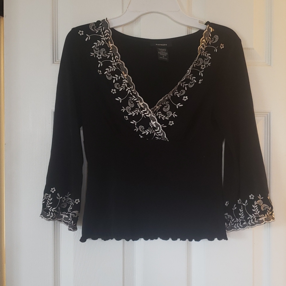 Black top with cream trim